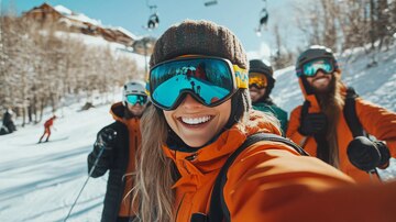 group-friends-taking-selfie-skiing-ski-resort_661495-86177